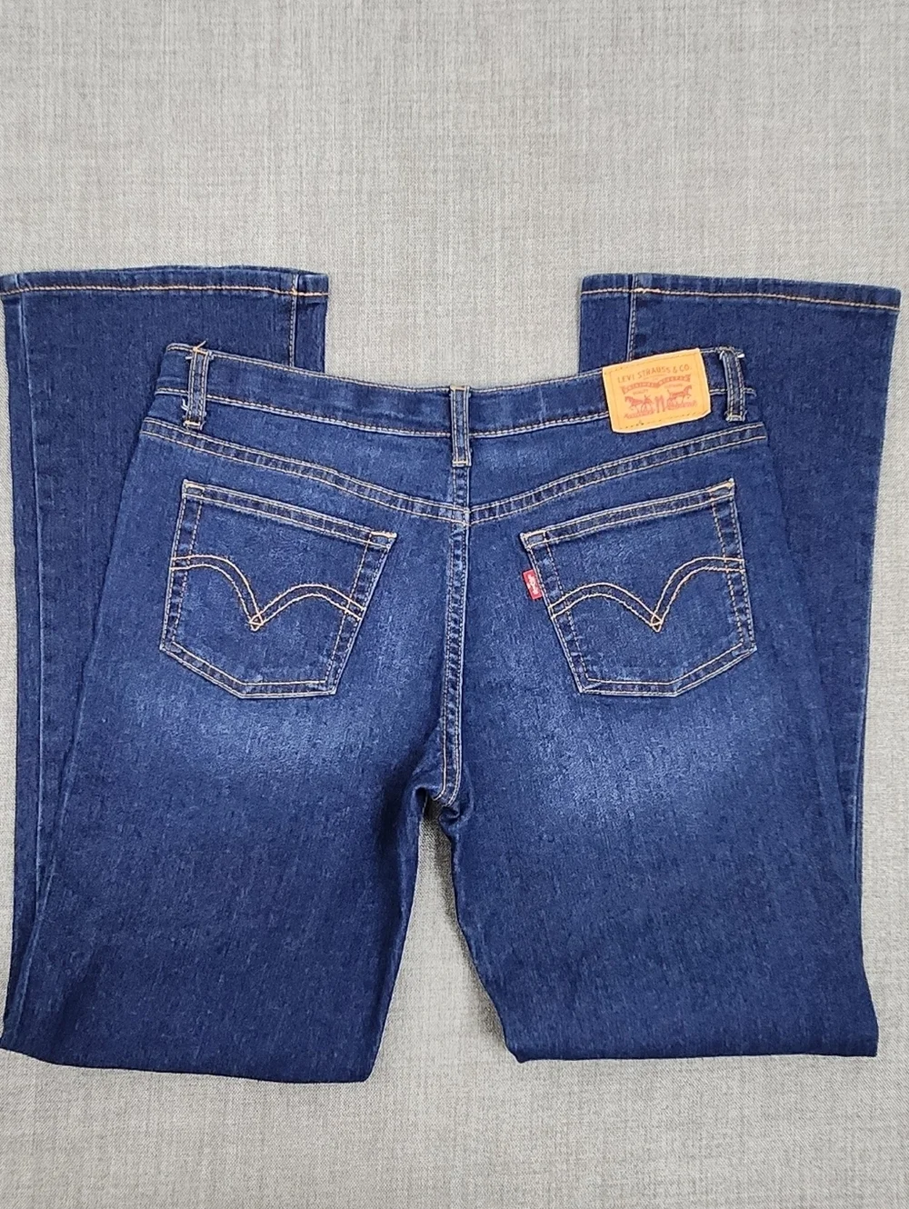 Levis Medium Wash Stretch Boot Cut Denim Jeans. 16.